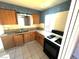 Kitchen with light countertops and black gas range at 2208 E Ogden Ave, Las Vegas, NV 89101