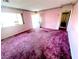 Front living room with windows providing natural light at 2208 E Ogden Ave, Las Vegas, NV 89101