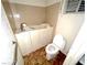 Accessible bathroom featuring walk-in bathtub, a toilet, and tile flooring at 2228 Saint Paul Way, Las Vegas, NV 89104