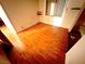 Bright bedroom featuring laminate wood flooring, a large window, and an additional storage nook at 2228 Saint Paul Way, Las Vegas, NV 89104