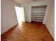 Empty bedroom with wood flooring and closet space at 2228 Saint Paul Way, Las Vegas, NV 89104