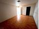 Cozy bedroom with hardwood floors, neutral walls, and natural light at 2228 Saint Paul Way, Las Vegas, NV 89104