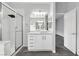 This bathroom features a vanity with double sinks and a glass enclosed shower at 2231 Desert Prairie St, Las Vegas, NV 89135