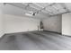Spacious two car garage with white walls and ceiling, ready for parking and storage at 2231 Desert Prairie St, Las Vegas, NV 89135