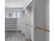 This walk-in closet features wood look floors, built-in shelving, and wood closet rods at 2231 Desert Prairie St, Las Vegas, NV 89135
