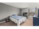 Bedroom featuring modern paint, carpet, and a desk and dresser at 2451 N Rainbow Blvd # 2067, Las Vegas, NV 89108
