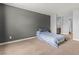 Neutral bedroom featuring carpet, paint and a doorway to the on suite bath at 2451 N Rainbow Blvd # 2067, Las Vegas, NV 89108
