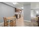 Eat-in kitchen features warm wood cabinets, stainless steel appliances, and bright natural light at 2451 N Rainbow Blvd # 2067, Las Vegas, NV 89108