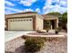 Charming single-story home with brick accents, landscaped yard, and two-car garage at 2575 Evening Twilight Ave, Henderson, NV 89044