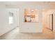 Bright kitchenette featuring tile floors and a window overlooking the front walkway at 2575 Evening Twilight Ave, Henderson, NV 89044