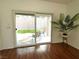 Bright living room with sliding glass doors to outdoor patio area with new furniture at 2575 Evening Twilight Ave, Henderson, NV 89044