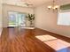 Open-concept living room featuring hardwood floors, natural light, and outdoor views at 2575 Evening Twilight Ave, Henderson, NV 89044