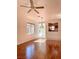 Living room showcasing hardwood floors, natural light, and an open layout at 2575 Evening Twilight Ave, Henderson, NV 89044