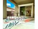 Cozy patio with seating area and view of the backyard at 2575 Evening Twilight Ave, Henderson, NV 89044