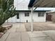 Rear exterior view of home and covered patio in backyard at 3100 Sequoia Ave, Las Vegas, NV 89101