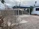 Spacious backyard featuring a carport at 3100 Sequoia Ave, Las Vegas, NV 89101