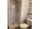 Bathroom with tiled walk-in shower and toilet at 3100 Sequoia Ave, Las Vegas, NV 89101