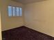 Bedroom featuring a shuttered window and neutral paint at 3100 Sequoia Ave, Las Vegas, NV 89101