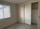 Bedroom featuring a closet and a window with blinds at 3100 Sequoia Ave, Las Vegas, NV 89101