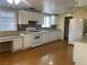 Full kitchen view with matching appliances, cabinets, and flooring, with plenty of natural light at 3100 Sequoia Ave, Las Vegas, NV 89101
