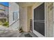 Exterior shot of entrance featuring security door, window, landscaping and 'Welcome' sign at 3125 N Buffalo Dr # 1105, Las Vegas, NV 89128
