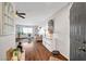 Inviting living room with wood floors, modern decor, and plenty of natural light at 3125 N Buffalo Dr # 1105, Las Vegas, NV 89128