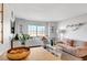 Bright open living room and dining area with views of the large window at 3125 N Buffalo Dr # 1105, Las Vegas, NV 89128