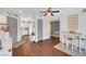 Bright open plan view of the living room with sight lines into the kitchen at 3125 N Buffalo Dr # 1105, Las Vegas, NV 89128