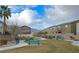 Community park featuring walking paths, benches, grass, and mountain views at 320 San Antonio River St, North Las Vegas, NV 89084