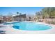 Community pool with a covered seating area offers a great way to cool off on hot days at 320 San Antonio River St, North Las Vegas, NV 89084