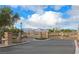 Gated community entrance, with mountain views in the distance, offers privacy and security at 320 San Antonio River St, North Las Vegas, NV 89084