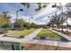Bocce ball courts in the community with lighting, landscaping, and seating at 3220 Flinthead Dr, North Las Vegas, NV 89084