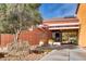 The Allianter Golf Club entrance with desert landscaping, rock signage, and an inviting porte cochere at 3220 Flinthead Dr, North Las Vegas, NV 89084