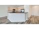 Modern kitchen with stainless steel appliances, breakfast bar, and plenty of counter space at 3220 Flinthead Dr, North Las Vegas, NV 89084