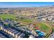 Aerial view of a community with baseball fields, tennis courts, and recreation areas at 3243 Fountaintree Ave, Henderson, NV 89044