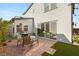 Patio area with grill and outdoor seating, accessible through sliding glass doors at 3243 Fountaintree Ave, Henderson, NV 89044