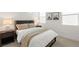 Cozy bedroom featuring a comfortable bed, bedside tables and stylish décor at 3243 Fountaintree Ave, Henderson, NV 89044