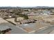 Sprawling aerial view of a well-kept single-story home with a large yard at 3450 Oakleaf Ave, Pahrump, NV 89048