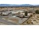 Expansive aerial view of a single-story home with ample yard space and mountain views at 3450 Oakleaf Ave, Pahrump, NV 89048