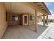 A covered patio presents an ideal spot for outdoor seating at 3450 Oakleaf Ave, Pahrump, NV 89048