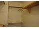 Walk in closet with built in shelving and hanging rack offers great storage solutions at 3745 Saint Peter Ct, North Las Vegas, NV 89031