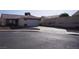 Single-story home featuring a tiled roof, two-car garage, and concrete driveway at 3745 Saint Peter Ct, North Las Vegas, NV 89031