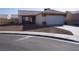Charming single-story home featuring a tiled roof and a two-car garage, complemented by desert landscaping at 3745 Saint Peter Ct, North Las Vegas, NV 89031