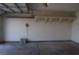 Interior of a garage with storage shelf at 3745 Saint Peter Ct, North Las Vegas, NV 89031