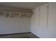 Interior of the garage featuring a storage shelf along the wall at 3745 Saint Peter Ct, North Las Vegas, NV 89031