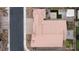 Stunning aerial view of a well-maintained home with a tile roof, paved driveway, and landscaped backyard at 3870 Valles Caldera Ct, Las Vegas, NV 89118