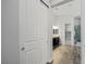 Hallway view of bathroom, showing closet, vanity and decorative shower at 3870 Valles Caldera Ct, Las Vegas, NV 89118