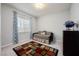 Comfortable room with plenty of sunlight coming through the window and a colorful decor at 3870 Valles Caldera Ct, Las Vegas, NV 89118