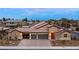 Beautiful single-story home boasts three-car garage and desert landscaping at 3870 Valles Caldera Ct, Las Vegas, NV 89118