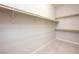 Spacious walk-in closet featuring ample shelving and closet rod space for optimal organization at 3870 Valles Caldera Ct, Las Vegas, NV 89118